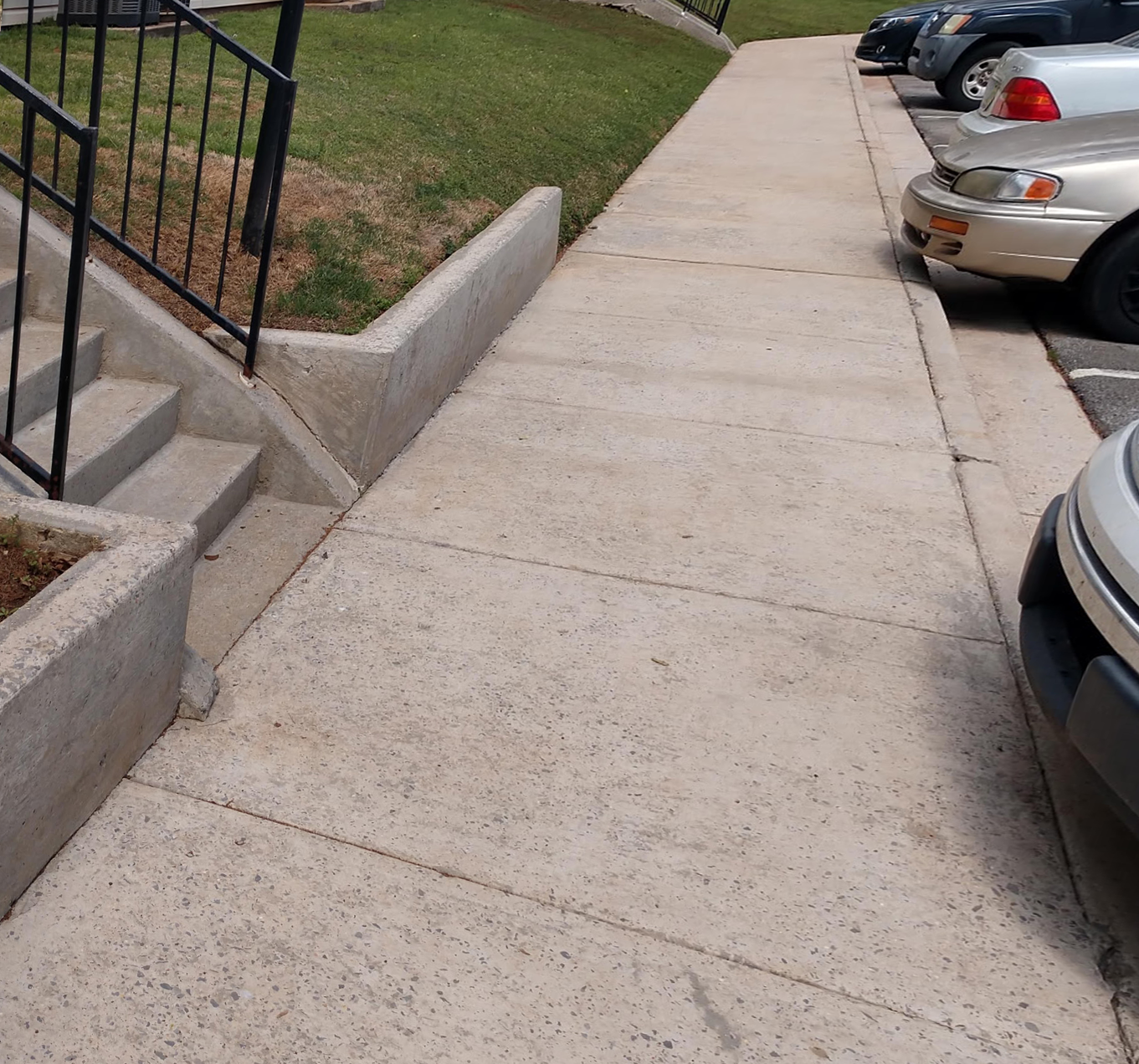 Before and after Driveway & Concrete Cleaning